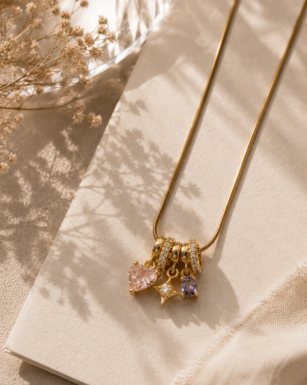 multicolored charm necklace on a canvas background