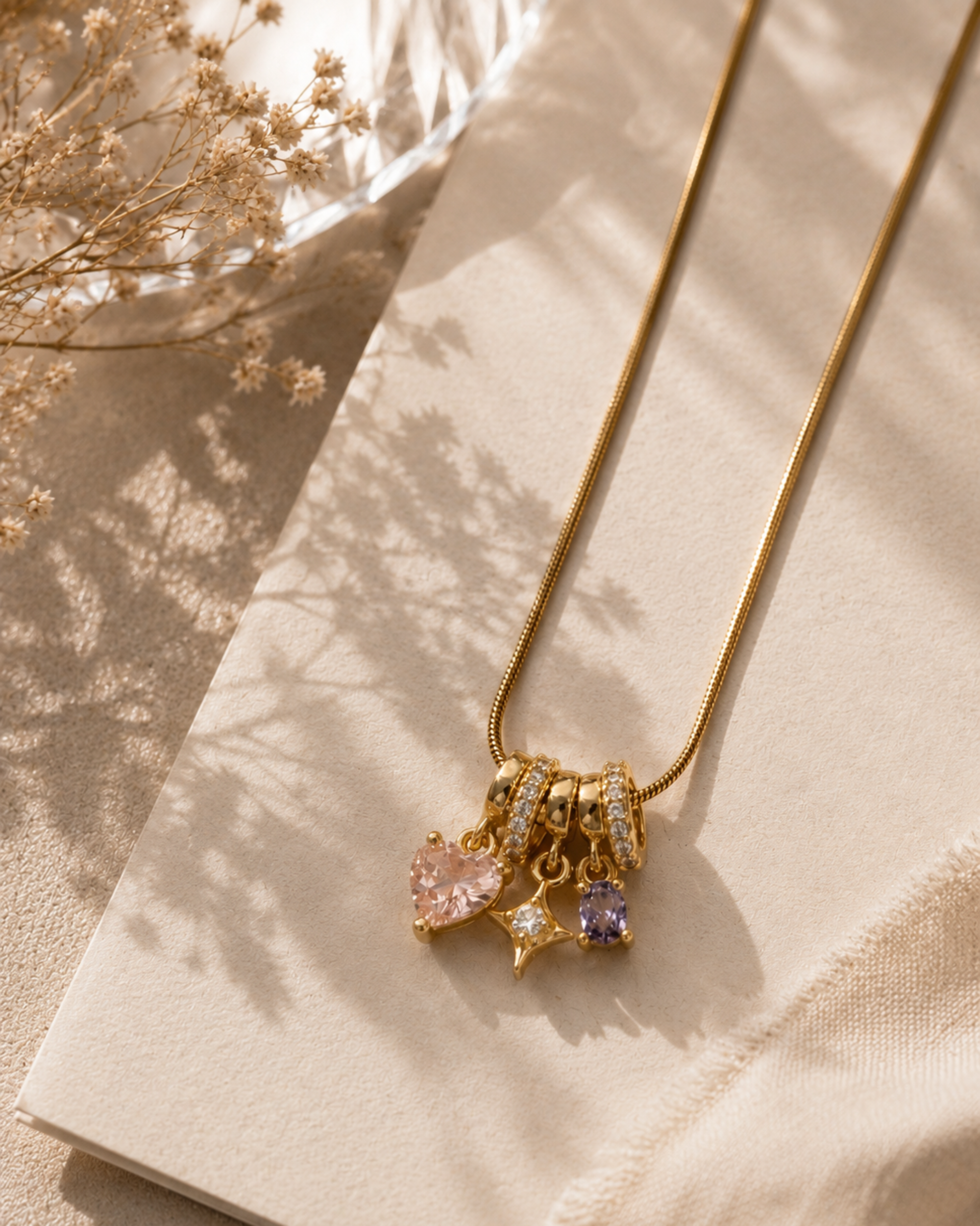 multicolored charm necklace on a canvas background